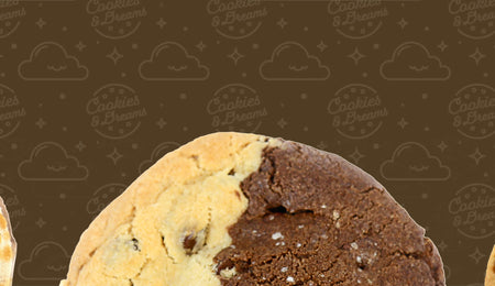 Dark brown background with 3 cookies at the bottom